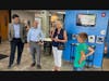 (Left) Congressman Brad Schneider, Representative Bob Morgan and Senator Julie Morrison talk with Aleksandr Samotskyi, age 12 from the Ukraine, about his experience in the U.S. and being a camper at the NSYMCA.
