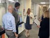 (Left to right) Representative Bob Morgan, Congressman Brad Schneider, Kathy Fielding, CEO of the Y, Senator Julie Morrison, and Debbie Madeley, Development Director, discuss future capital projects to enhance the facility at the NSYMCA.
