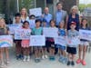 (Back) Kathy Fielding, Rep Morgan, Congressman Schneider, Senator Morrison visit with Y campers (Front) Violet Walter, Gabby Wilkins, Madison Albores, Christopher Jin, Leo Huangbo, Jacob Mintz, Barrett Slutsky, Alice Kuby, Ryan Sansoterra, Lili Cherubin. 