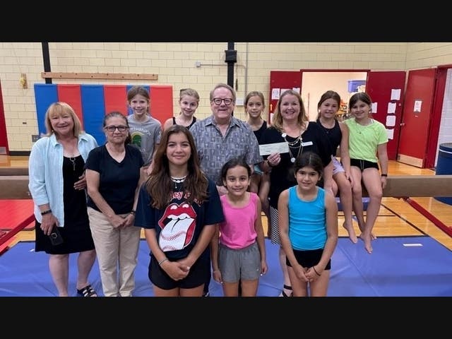 Caption:  (left top) Zoe Degnan, Madelyn Elbaum, Dan Westel-Civic President, Alexa Morales, Kathy Fielding-NSYMCA CEO, Elayna Finder, Caroline Jaffe. (Left Bottom) Debbie Madeley-NSYMCA, Anastasia Gonzalez-Civic, Alayna Drozt, Mila Shah and Aryana Shah.