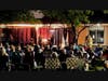 Photo Caption:  At sunset, “Live on the Lawn” featuring the Wayne Messmer Quartet Sept 8th at the NSYMCA in Northbrook