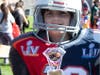 At the NSYMCA’s Fall Fest on Sunday Oct 22, an 11 year old boy dressed in Tom Brady dueling jerseys proudly smiles at his win for “Most Creative Costume” in the Y costume contest.