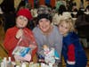 Caption:  The Wilson Family pack blessing bags together and give back to their community at the North Suburban YMCA Annual Holiday Giveback event on December 9th. (left to right: Archie, Robin, Charlie)