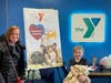 CAPTION 2:  Erika and Olivia Hannibal show off their blanket at the NSYMCA Fleece for Fur Babies Event on March 10th.
