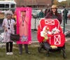 At the NSYMCA’s Fall Fest on Sunday Oct 13, the costume contest winners, “The old lady”, “Ken doll” and the “barnyard family” show off their awards. 