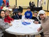 The Mercado Family, Glenview residents and Y members, came together to help with the multigenerational event, the NSYMCA 7th Annual Holiday Giveback.  Jessica Mercado, Madelyn Mercado, Zeke Mercado, Jaiden Wilkinson, Rupert Mercado and Matt Wilkinson.