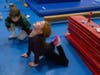 Children get a chance to use the gymnastics equipment while exploring the event at the NSYMCA Youth Explorer Expo on Sunday, January 12.