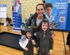 Aneliese Baker of Deerfield with her sons Jack age 6 & Charlie age 4, attend the NSYMCA Youth Explorer Expo on Jan 12th, after participating in the Family Swim Event.