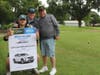 Three Generations of the Dahlke Family, (from Left) Danny, Bob Jr and Bob Sr, try to win a Mercedes Car donated by Autohaus on Edens.  