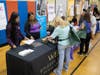 Warren Barr North Shore distributes valuable information and offers branded gifts to guests at the NSYMCA 10th Annual SeniorPalooza Health Fair. 