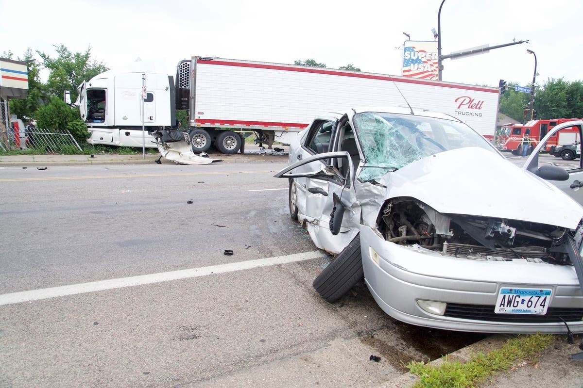 Semi Runs Red Light, Crashes Into Car In Minneapolis Police