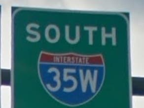 The Fusion was traveling at approximately 83 miles per hour when it hit the I-35W barrier wall, police said.