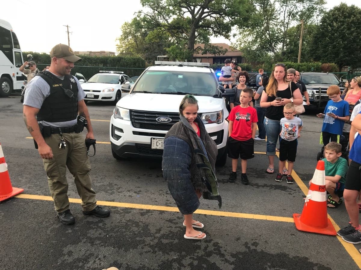 National Night Out events, like the one shown here in Palos Heights, Illinois, are scheduled in St. Louis Park, and many other places across the country, to strengthen the relationship between police officers and the community. 