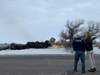 Gov. Tim Walz visits the train derailment site in Raymond, Minnesota.