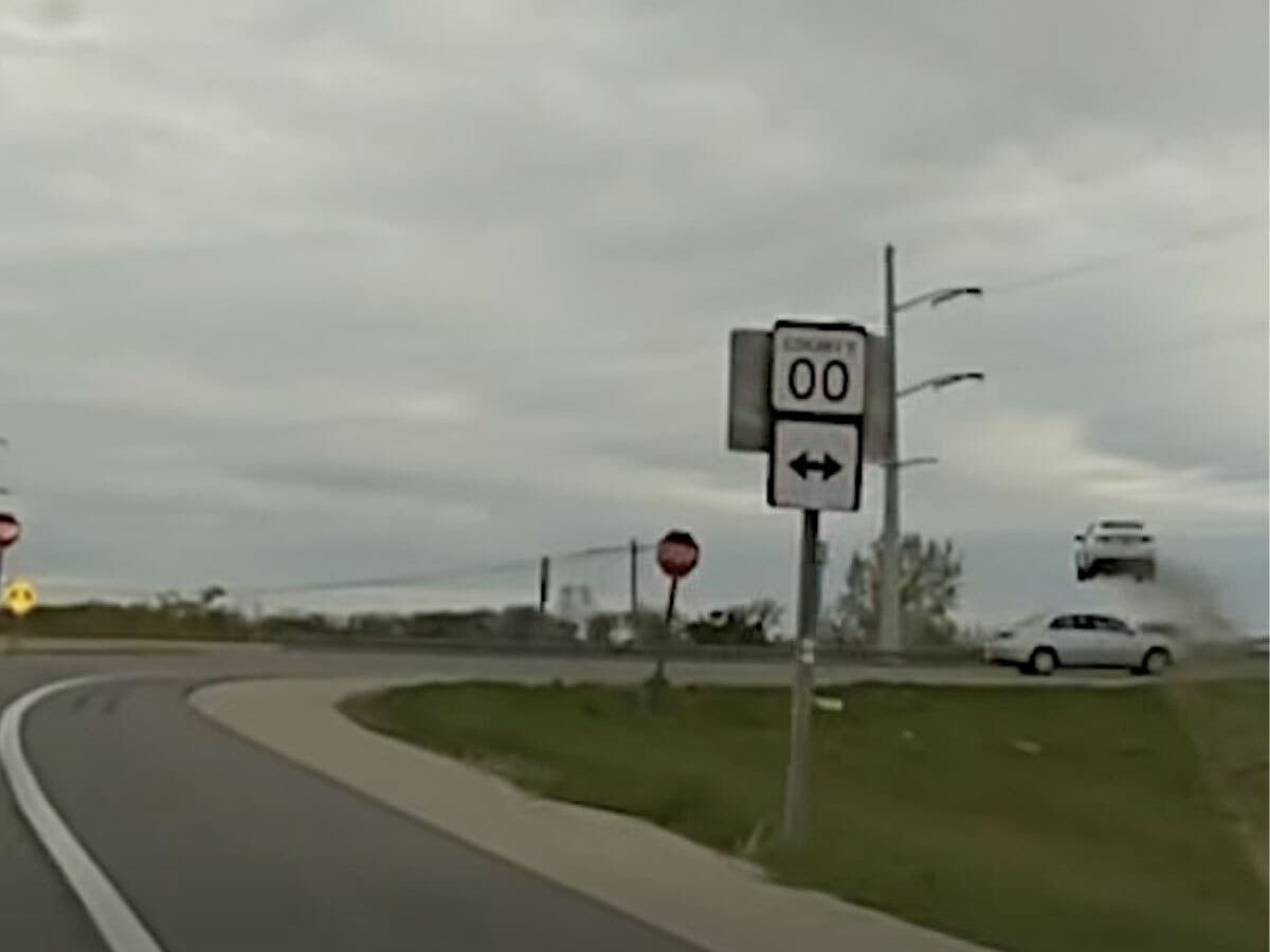 A Wisconsin police chase ended with a fleeing vehicle flying over traffic and landing in a field, according to authorities.