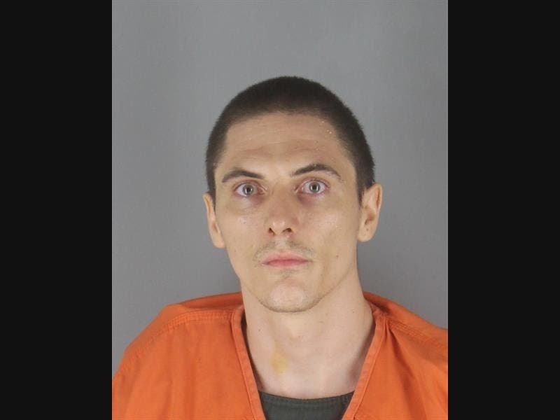 A Minneapolis man fired up to 20 rounds at law enforcement officers through the walls, windows and doors of a Nicollet Avenue apartment June 9, prosecutors say, according to charges filed this week in Hennepin County District Court.