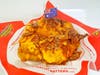 Honey Brisket Battered Potatoes — Australian Battered Potatoes tops its fried potatoes with beef brisket, nacho cheese and hot honey.