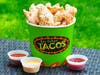 Bucket of Chicharrones — San Felipe Tacos fries pork rinds seasoned with chili and lime, served with three dipping sauces.
