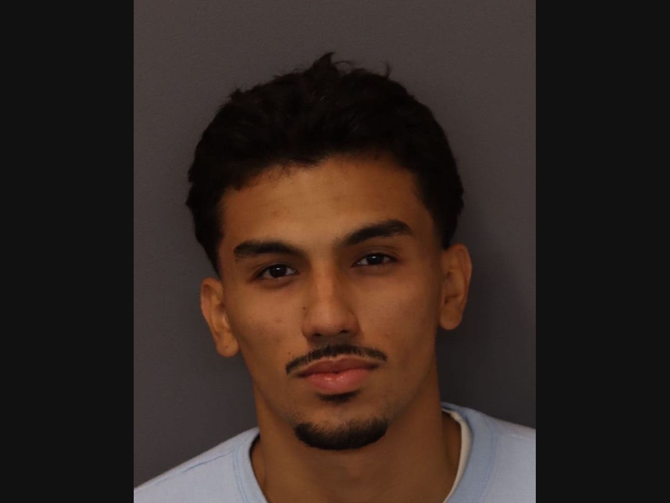 The victim told law enforcement that Rayan Louis Tolentino-Pubill, 21, of West St. Paul, elbowed him in the face and pulled his lip during the play.