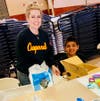 Chaparral Middle School teacher Sherry Robertson and son Riley prepare for dinner service at the East San Gabriel Valley