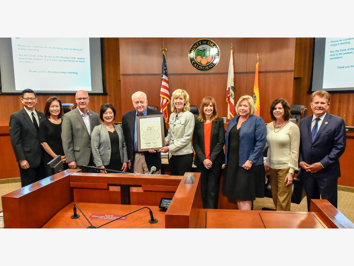 Chairwoman Lisa Bartlett presented OCVA Chairman Jay Burress and OCVA President & CEO Ed Fuller with a resolution.