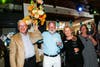Korey Johnson, chair LFP holds the gifting tree with Volunteer George Heed, board members Cynthia Carson and Katie Moss