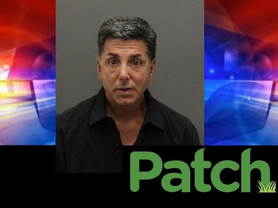 Richard Scott Bloustine, 53 of Newport Beach, was arrested following a car chase through south OC.