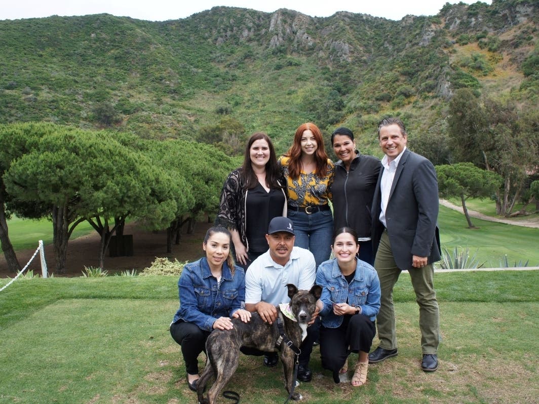 The staff of The Ranch at Laguna Beach, together with Portia and her owner.