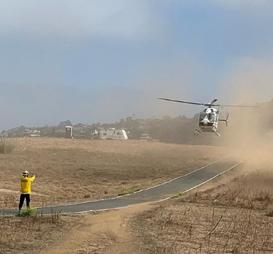 Laguna Beach Firefighters and Mercy Air trained in July on the fire road.