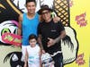Mario Lopez and son, Nico, pose with pro skater Christian Hosoi, right, of the official @BonesLoveMilk Skate Team, at an event hosted by the California Milk Processor Board dedicated to celebrating skate and California street culture.
