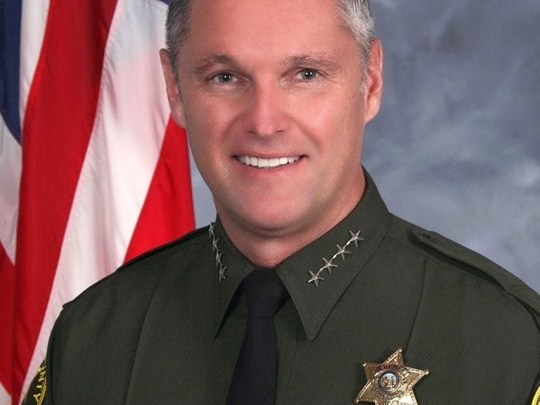 Sheriff Don Barnes wants you to shove him over the edge for a good cause.