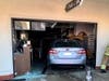 A car busted through a Los Alamitos nail salon front window, Tuesday.