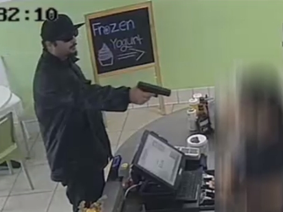 Police are seeking a man who held up a Garden Grove yogurt store at gunpoint.