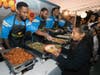 Los Angeles Chargers football player Casey Hayward and his fellow teammates host a pre-Thanksgiving dinner Monday for 150 low-income students and families.