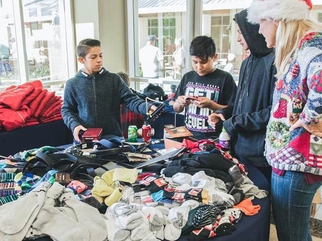 Help children shop for a special gift for their parents, through the OC Rescue Mission.