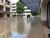 A large courtyard between buildings was completely flooded, Wednesday.