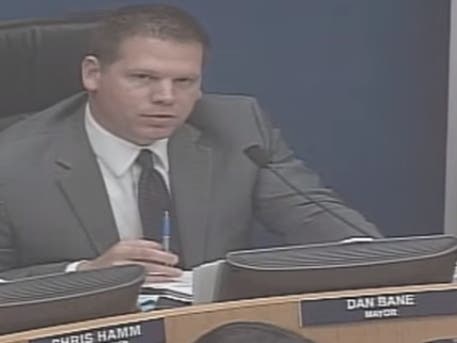 San Clemente Mayor Dan Bane describes Short Term Apartment Rental permit policy at the city council meeting to those present.