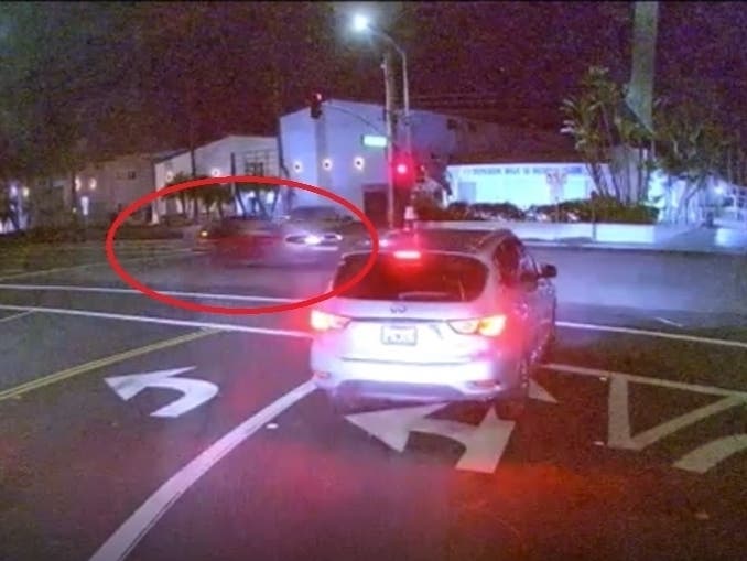 Police are seeking information on a red SUV that collided with a pedestrian in late December.