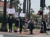 Rancho Santa Margarita protesters gathered on a street corner, chanting "We Can't Breathe" as they decried the death of George Floyd.
