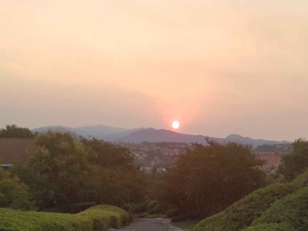 Orange County has seen its share of burnt umber skies this week, but no sunset was captured more beautifully than this one by Daniel Salgado.