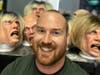 Makeup artist and mask designer Jason Adcock, with a few of his friends.