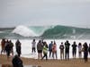 Crowds of spectators gathered at Newport Beach's Wedge surf spot to see the brave or foolish venture into the pounding waves.