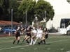 TVHS soccer players Kate Jacobson and Natalie Mitchel vying to win the ball out of the air.