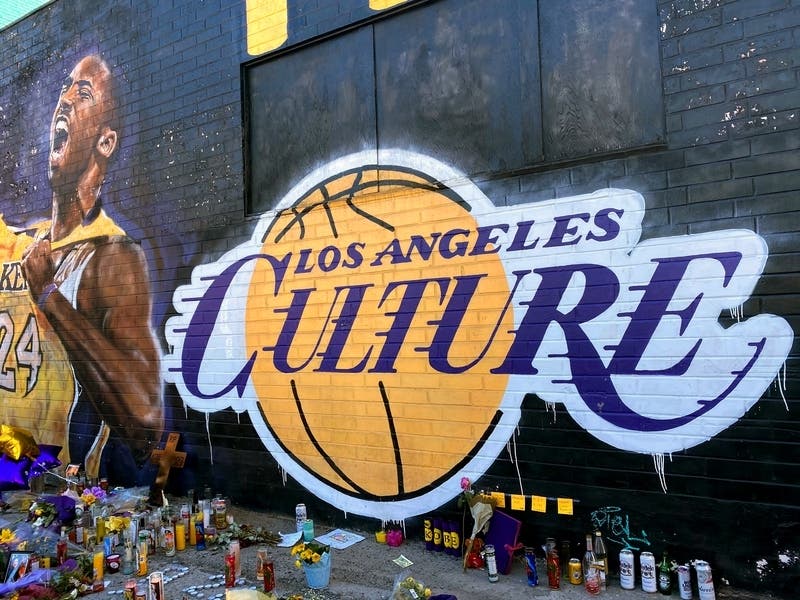 A settlement is under consideration over unauthorized sharing of photos of the aftermath of the devastating crash that killed loved ones.