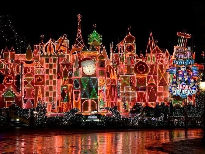 Small World is decked in lights this year, though the ride was delayed to open due to flooding that affected machinery in the attraction, officials said.