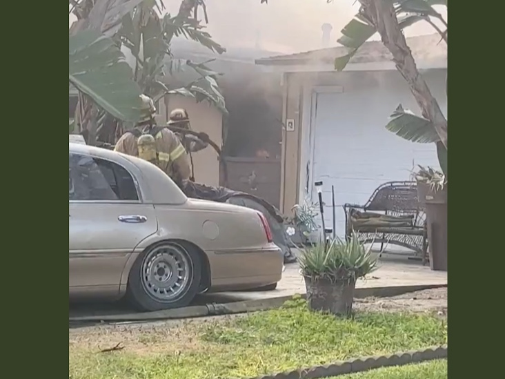Firefighters encountered a blaze inside the Stanton home where excessive storage conditions were found.