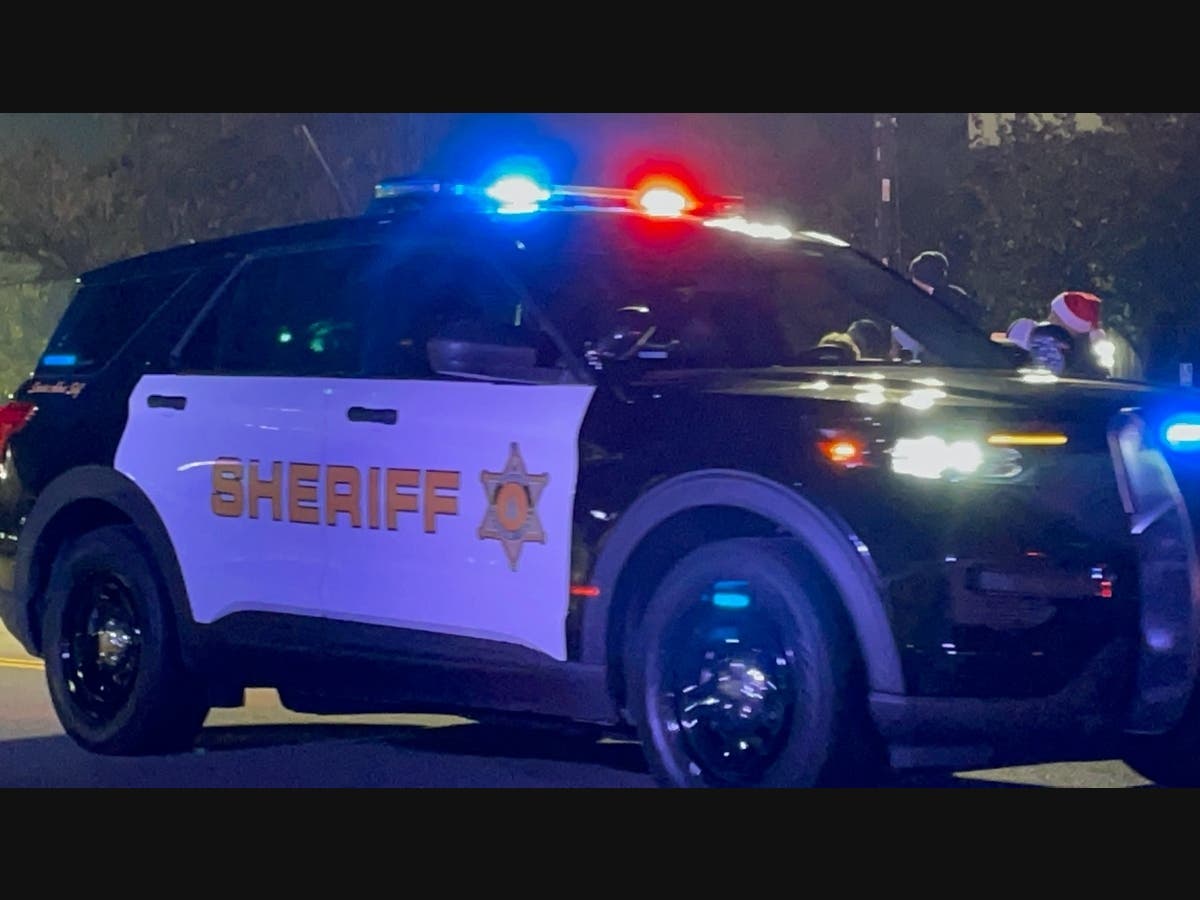 A 54-year-old Orange County woman was struck by a big rig while crossing the street over the weekend, investigators say.