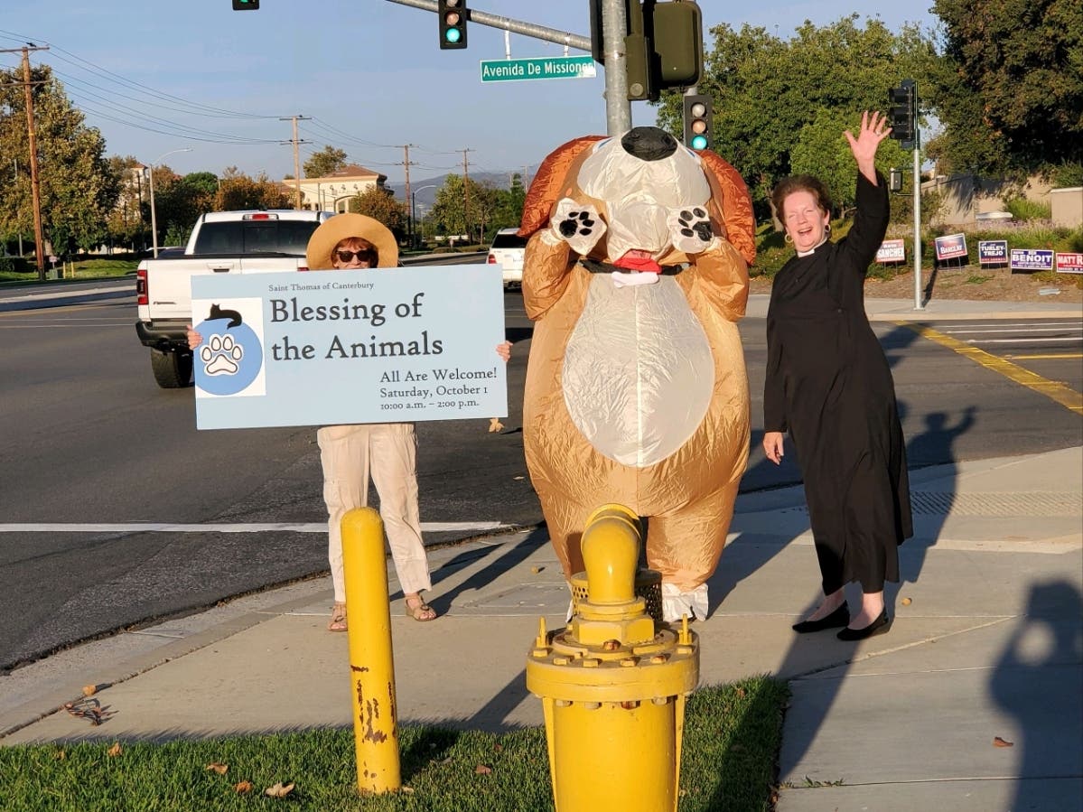 Rev. Carole Horton-Howe waves as the St. Thomas Episcopal Church in Temecula prepares for its annual Blessing of the Animals event.