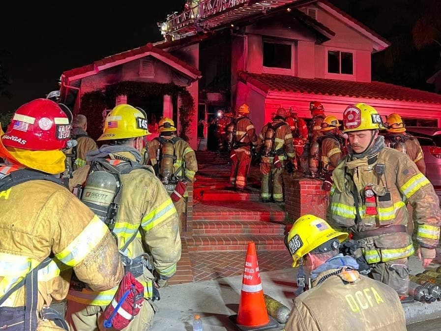 Firefighters worked to douse a house fire Saturday night in Lake Forest.