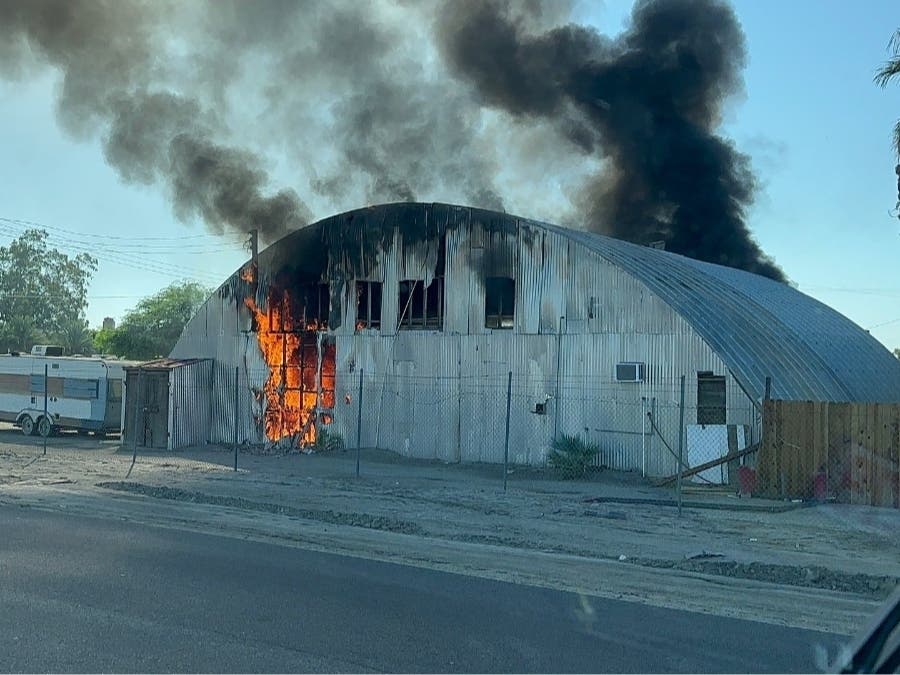 A large metal building caught fire Monday.